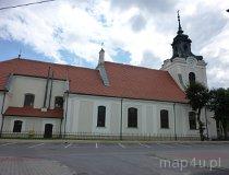 Wolb&oacute;rz. Kości&oacute;ł pw. św. Mikołaja.
Murowany, z XV w. Widok ze strony Urzędu Gminy w Wolborzu. (fot. Renata Leśniak-Kordzińska)